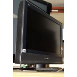 A PANASONIC 26'' FSTV (one remote)