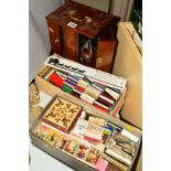 A SMOKERS STAND containing pipes etc, together with two boxes of various matchboxes