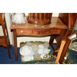 A GEORGIAN MAHOGANY SERPENTINE FOLD OVER TEA TABLE with a single drawer on shaped legs, width 85cm x