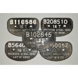 FIVE ASSORTED CAST IRON WAGON PLATES, all are repainted, raised white lettering on black background,