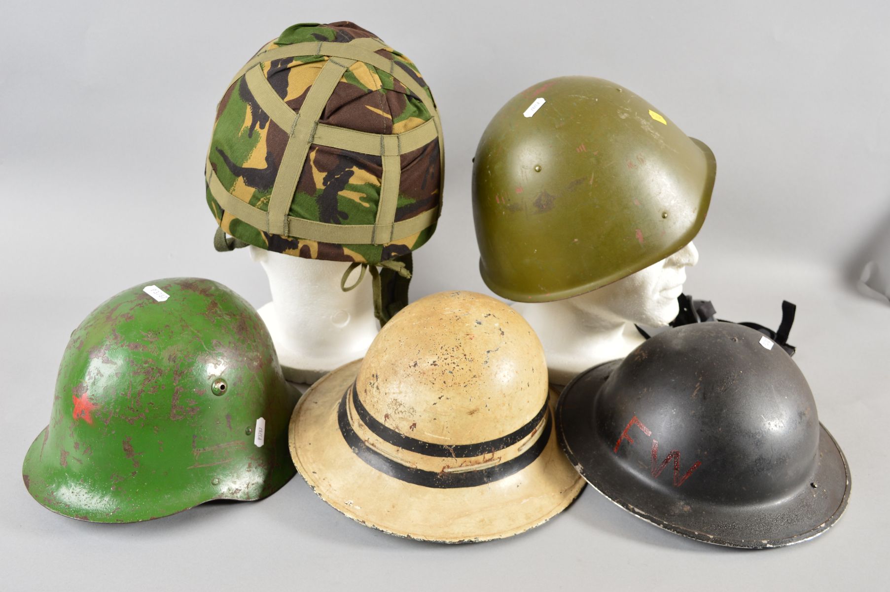 A BOX CONTAINING FIVE MILITARY HELMETS, as follows, Post War WWII era Eastern Block helmet, green - Image 4 of 8