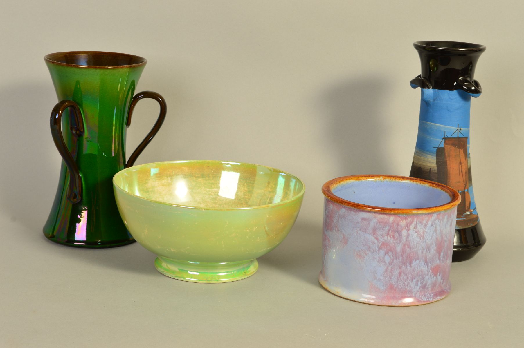 A SMALL GROUP OF POTTERY to include a Moorcroft iridescent green bowl, some wear to the ground,