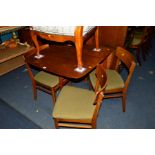 A WRIGHTON 1960'S TEAK DROP LEAF TABLE and four chairs (5)