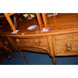 A GEORGE IV MAHOGANY, SATINWOOD BANDED AND INLAID BOW FRONT SIDEBOARD, fitted with single drawer