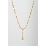 AN IMITATION PEARL PENDANT NECKLACE, designed as a pear shape imitation pearl drop suspended from an