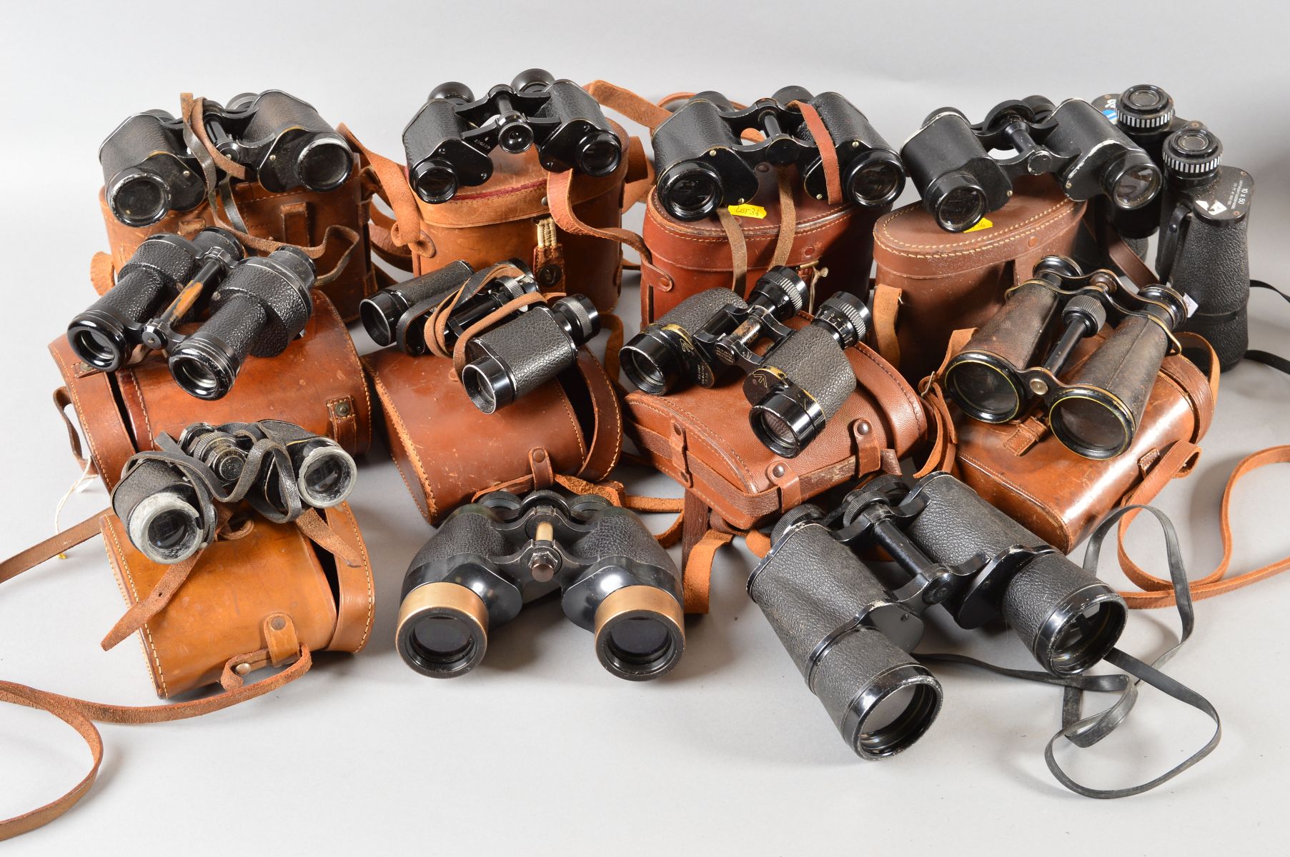 A BOX OF CONTAINING TWELVE PAIRS OF BINOCULARS, Military & Civilian use, WWI era to present day,