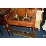 AN ARTS AND CRAFTS OAK DESK, with a raised back and slatted sides, brown leather top and two drawers