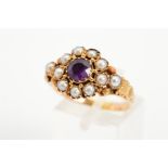 A LATE VICTORIAN GOLD AMETHYST AND SPLIT PEARL RING, the central circular amethyst within a split
