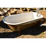 A VICTORIAN CAST IRON ENAMELLED BATH TUB on four cabriole legs, width 67cm x length 165cm x height