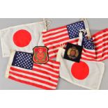 A SMALL BOX CONTAINING THREE SMALL USA FLAGS, and two small Japanese flags, together with a gold
