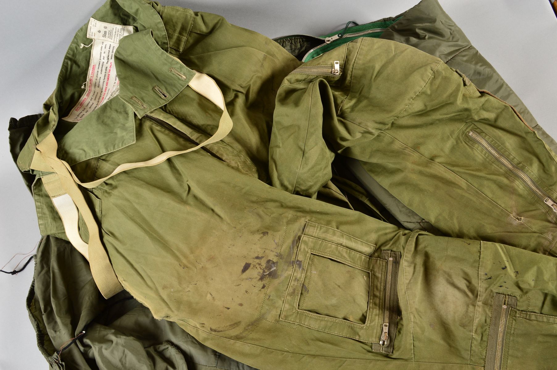 A BOX CONTAINING A MILITARY ISSUE GREEN BIVOUAC STYLE SLEEPING BAG, Air Crew trousers, Military - Image 3 of 3