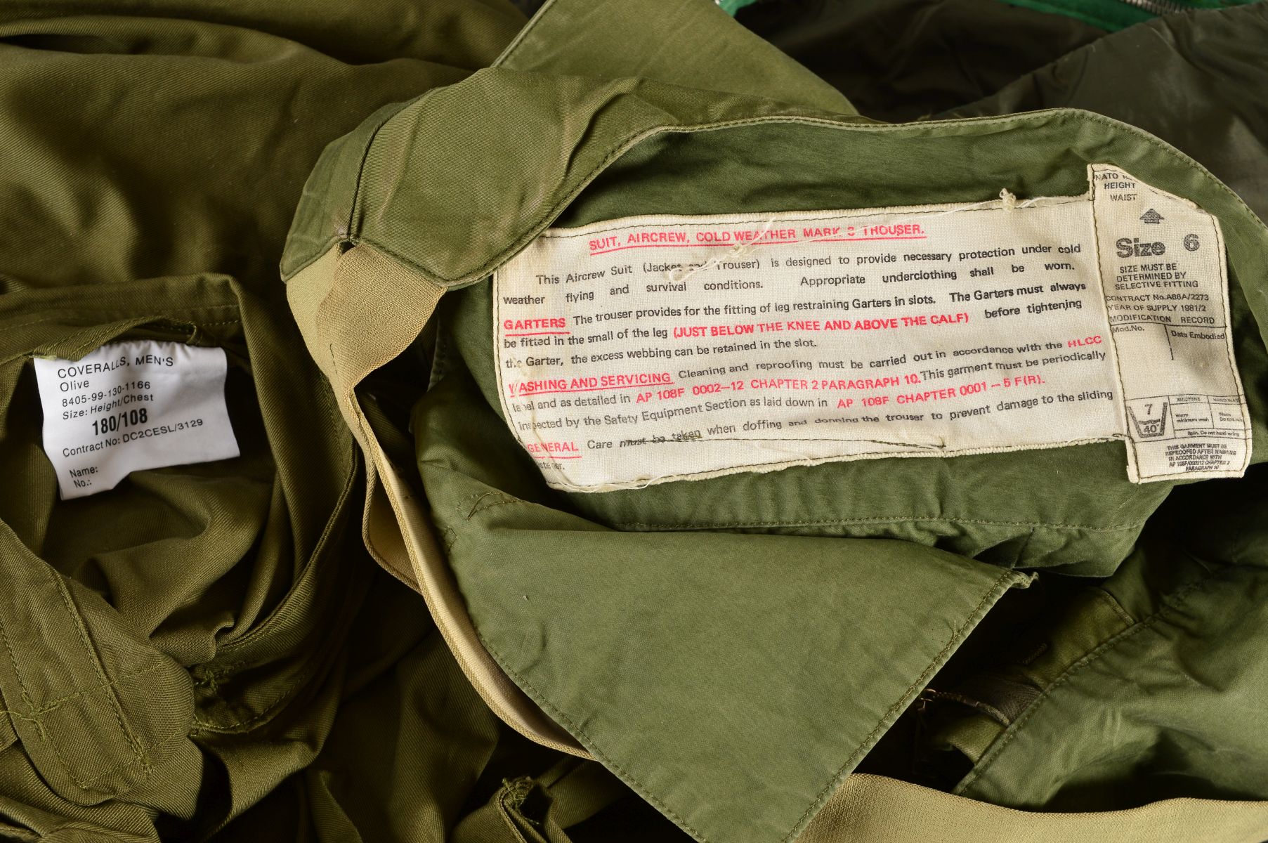 A BOX CONTAINING A MILITARY ISSUE GREEN BIVOUAC STYLE SLEEPING BAG, Air Crew trousers, Military - Image 2 of 3