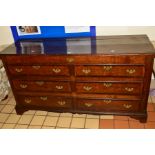 A GEORGIAN AND LATER OAK AND MAHOGANY BANDED COFFER, with six dummy drawers on bracket feet, width