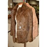 TWO CONEY FUR JACKETS, one pale in colour, one a darker shade of brown, approximate size 14