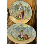 TWO ROYAL DOULTON SERIES WARE PLATES depicting Moorish Traders beside a rose trellis fence with a