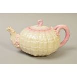 A VICTORIAN BELLEEK TEAPOT, of circular shell form, the handle and knop of spout modelled as