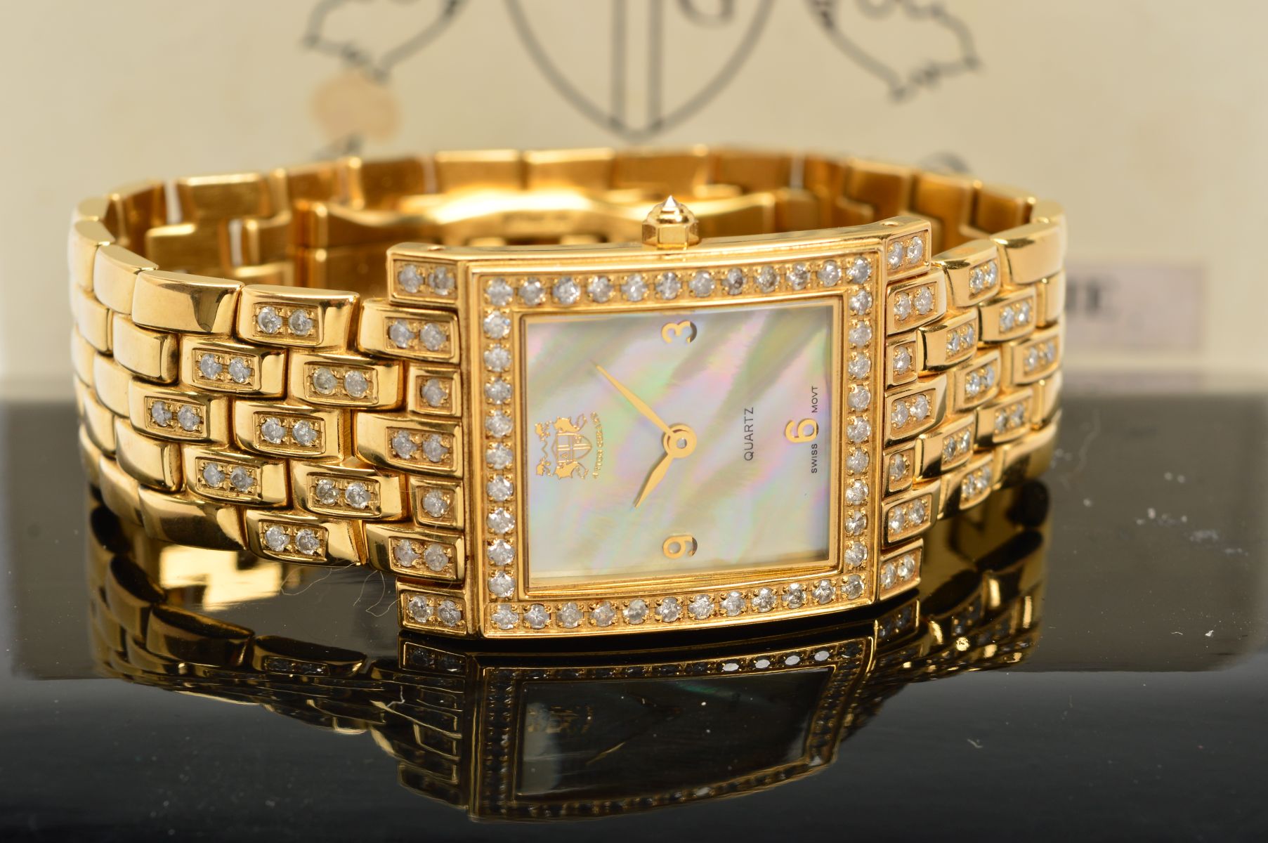 ASTON GERARD GOLD PLATED QUARTZ WRISTWATCH, rectangular diamond case, lugs and beginning of