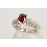 A GLASS FILLED RUBY AND DIAMOND DRESS RING, designed as a central oval ruby in a six claw setting,