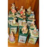 TWELVE VILLEROY & BOCH FOXWOOD TALES SCULPTURES (with eleven tins and nine certificates), from