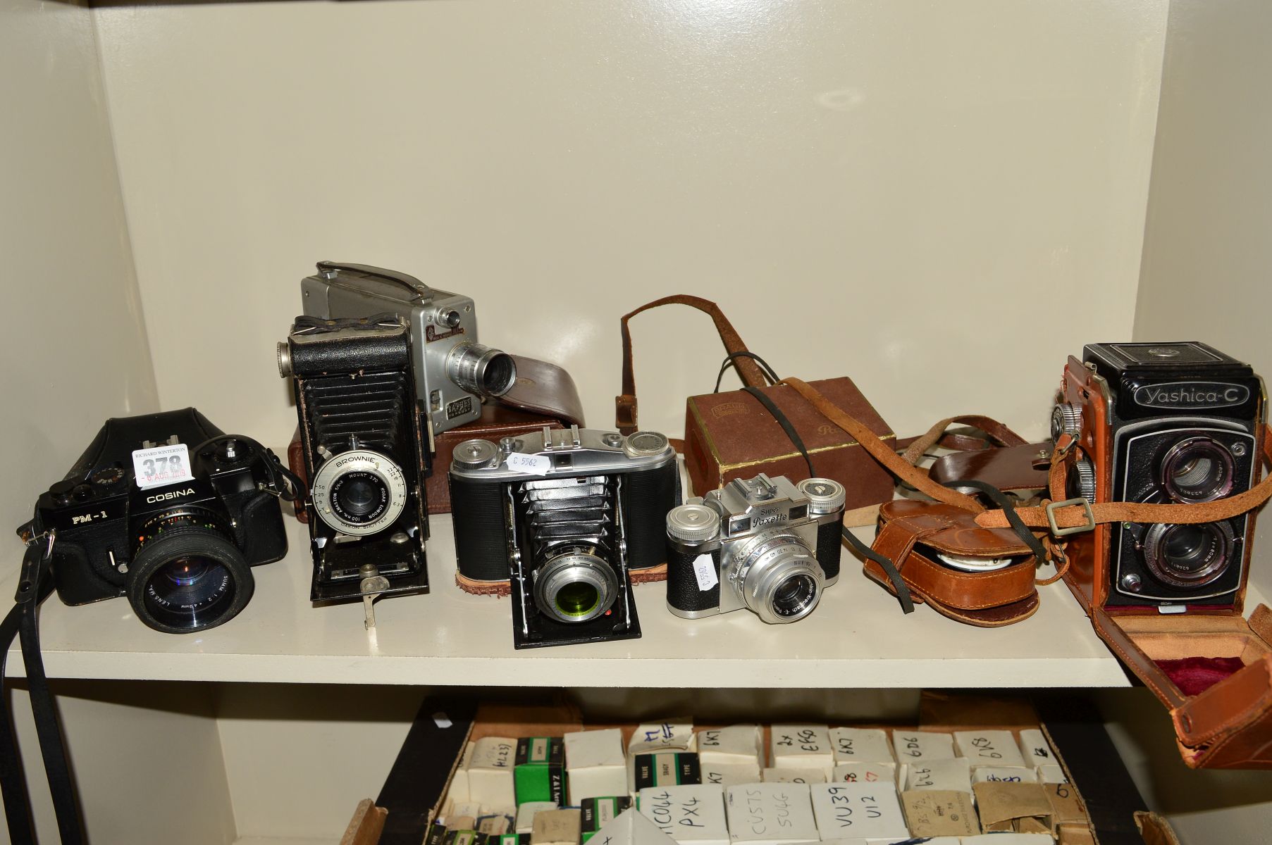 A COLLECTION OF VINTAGE CAMERAS including a Yashica C TLR, a Cosina PM-1 SLR, a boxed Braun Super