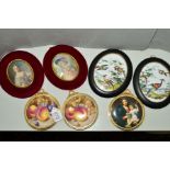 A PAIR OF SEVERN WARE CHINA FRAMED CIRCULAR PLAQUES, fruit decorated and signed N. Creed, overall