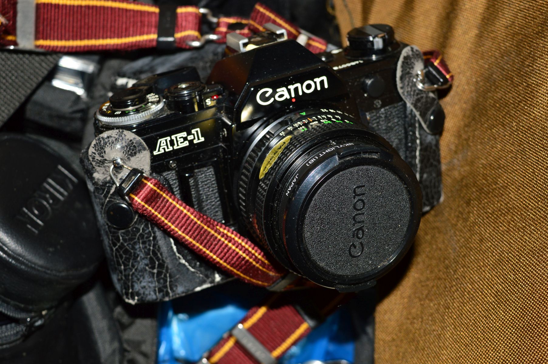 A CANON AE-1 SLR CAMERA, fitted with a 50mm f 1.8 in black, two Kiron lenses , a Kodak Vest - Image 2 of 3