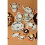 ROYAL CROWN DERBY MINIATURE TABLEWARES, to include coffee pot, teapot, two cups, a saucer, two