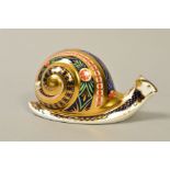 A LIMITED EDITION ROYAL CROWN DERBY PAPERWEIGHT, 'Garden Snail' No1411/1500, no certificate, dated