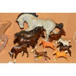 A GROUP OF NINE BESWICK HORSES/FOALS, to include Foal (grazing) No946 (brown, 2nd version), four