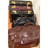 TWO LEATHER BAGS BY HIDESIGN, a brown weekend bag, missing shoulder strap and a black holdall,