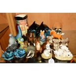 A GROUP OF ORNAMENTS, to include Royal Doulton Disneys 101 Dalmations 'Lucky' DM8 and 'Penny and