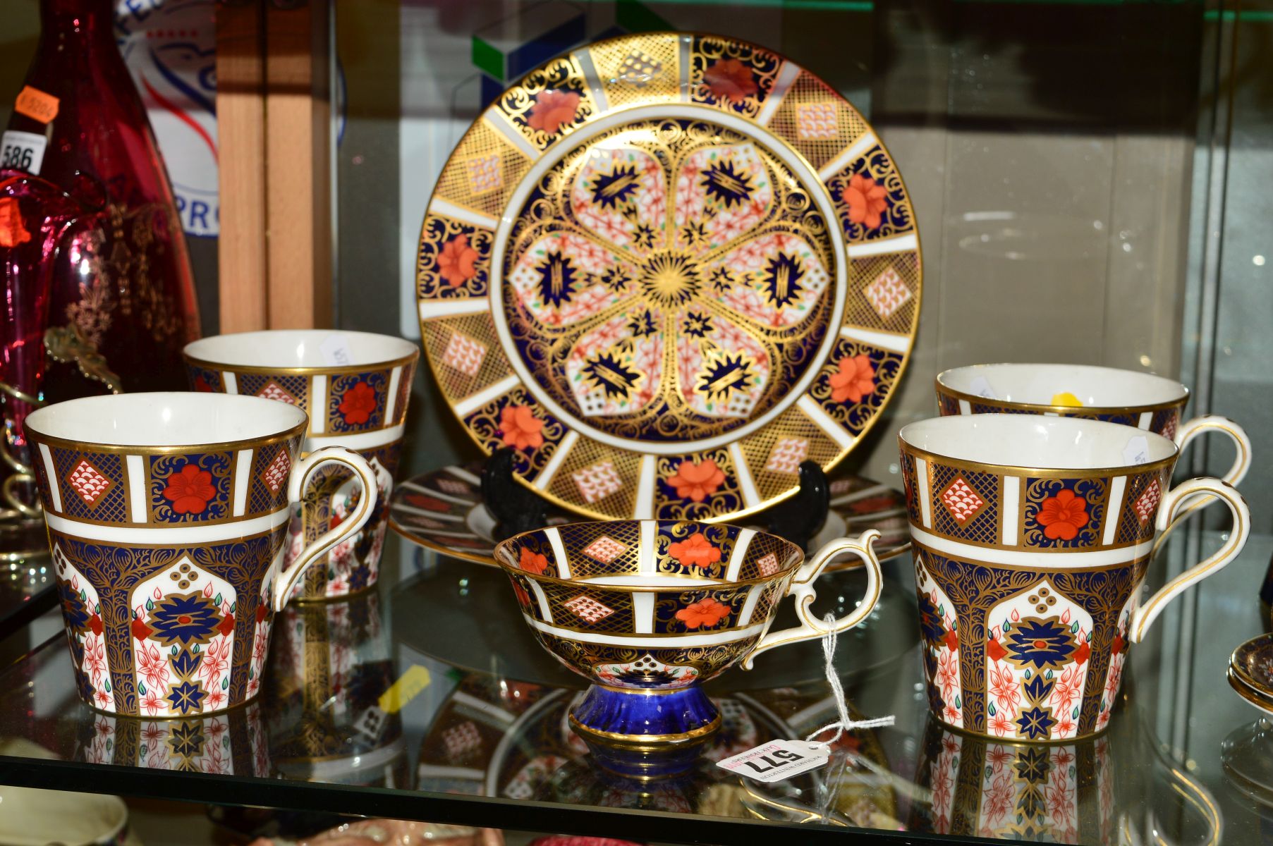 A GROUP OF ROYAL CROWN DERBY IMARI ITEMS, '1128' pattern, to include two plates, diameters 23cm (