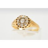 A LATE VICTORIAN DIAMOND CLUSTER RING, designed as a cluster of old cut diamonds, estimated total