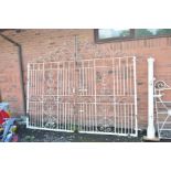 A PAIR OF 20TH CENTURY WHITE PAINTED WROUGHT IRON GATES (no posts) bearing initial C and E, total