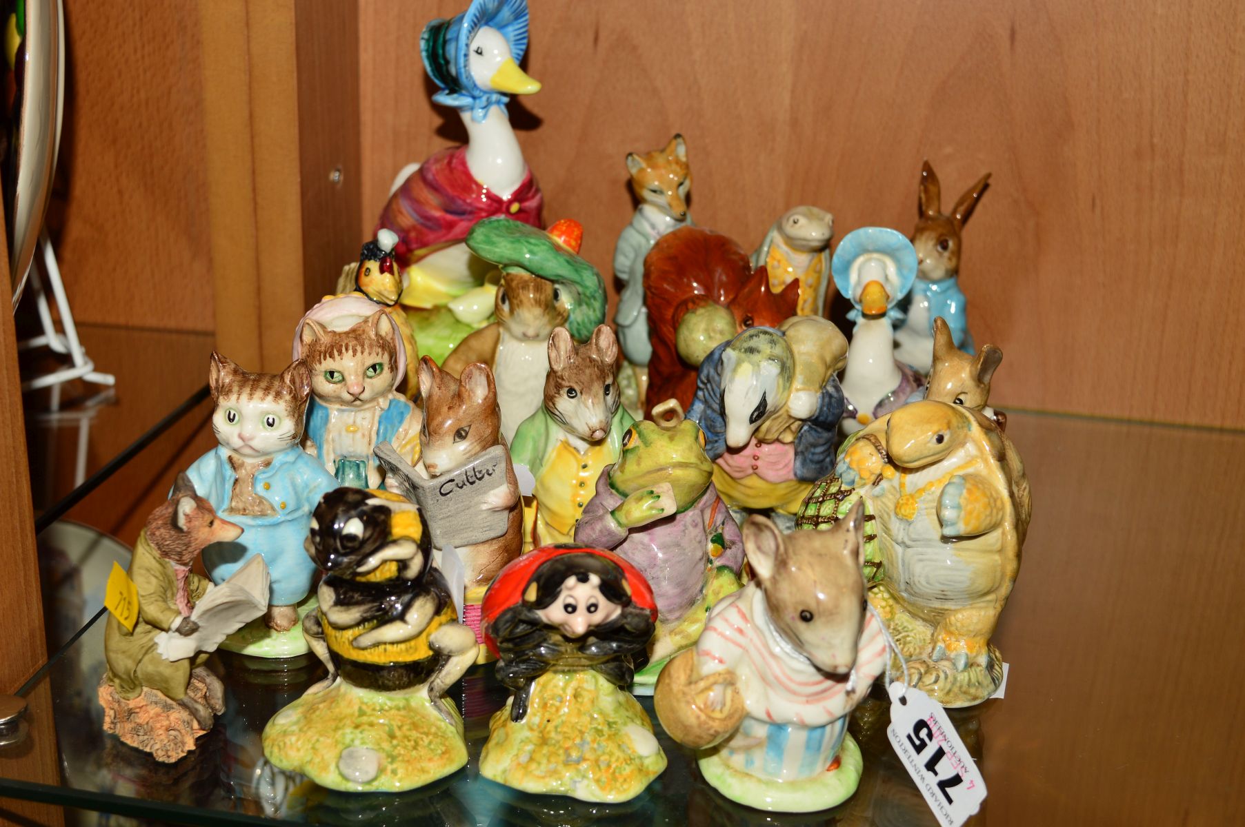 A GROUP OF BEATRIX POTTER FIGURES to include sixteen Beswick 'Mrs Tittlemouse' BP2b, 'Mr Jeremy