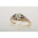 A SINGLE STONE DIAMOND RING, designed as a claw set old cut diamond with three rose cut diamonds