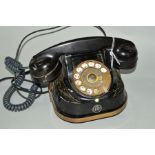A VINTAGE RTT BELL TELEPHONE FROM MFG COMPANY, with brass folding carry handle (converted to
