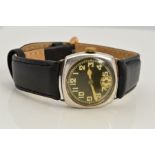 AN EARLY 20TH CENTURY SILVER CUSHION SHAPED WRISTWATCH, cushion shaped case, black dial with bold