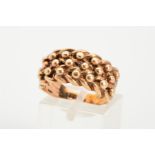 A 9CT GOLD GENTLEMAN'S RING, of plaited and beaded design, with 9ct hallmark for London 1978, ring