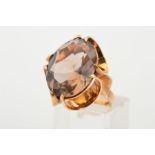 A 1970'S 9CT GOLD SMOKY QUARTZ RING, designed as an oval smoky quartz within a claw setting, the