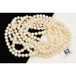 AN EXTRA LONG FRESHWATER CULTURED PEARL NECKLACE, consisting of a single row of near uniform