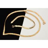 A 9CT GOLD TRI-COLOUR TWIST NECKLACE AND MATCHING BRACELET, designed as flattened chains in a