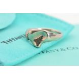 A CASED TIFFANY & CO. ELSA PERETTI RING, designed as an open band with an abstract heart shape