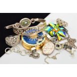 A SELECTION OF JEWELLERY, to include an oval locket and chain, a child's expandable bangle, a torque