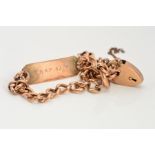 AN IDENTITY BRACELET, designed as a curb link bracelet with rectangular panel engraved with name and