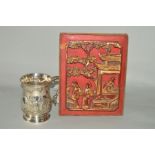 A SILVER PLATED TANKARD, with embossed detail, height 12.5cm, together with a carved oriental