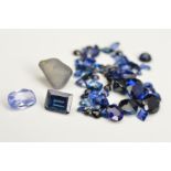 A COLLECTION OF SAPPHIRES, to include one faceted sapphire and crystal, a collection ranging between