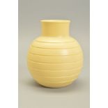 KEITH MURRAY FOR WEDGWOOD, a spherical vase with incised decoration, in a matt pale yellow ground,