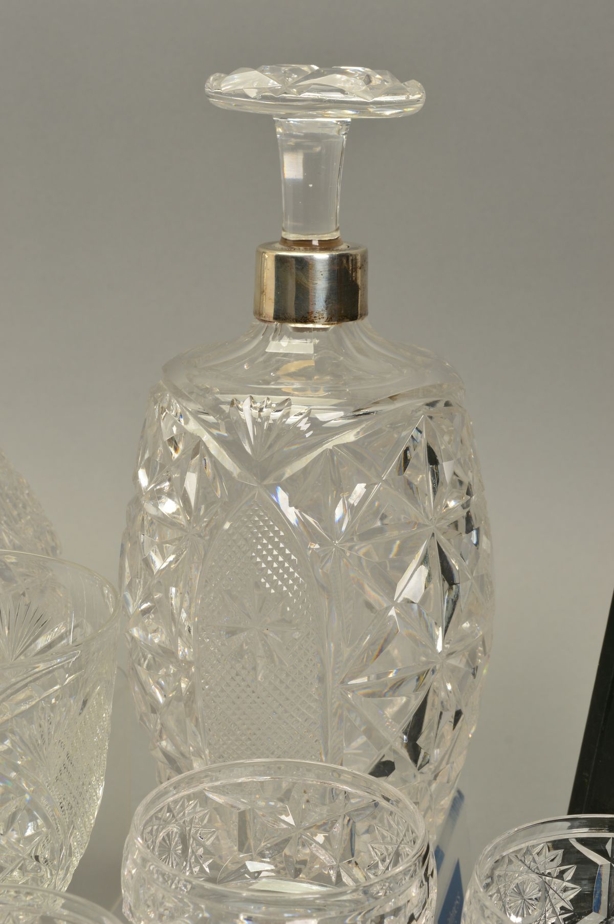 JOHN WALSH WALSH, an early 20th Century part table suite comprising a low shouldered decanter with - Image 7 of 8