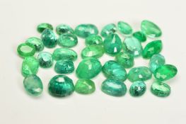 A SELECTION OF OVAL CUT EMERALDS, measuring approximately 3.9mm x 2.8mm - 7.1mm x 5.1mm, approximate
